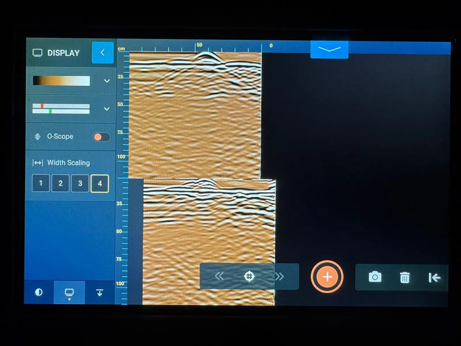 Ground penetrating radar data being interpreted on screen